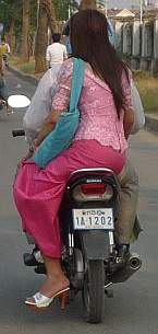 Formal dress on a motorcycle